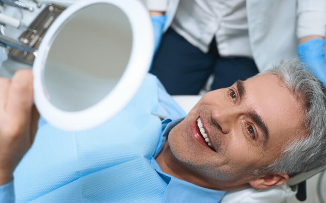 man receiving dental implants in Idaho